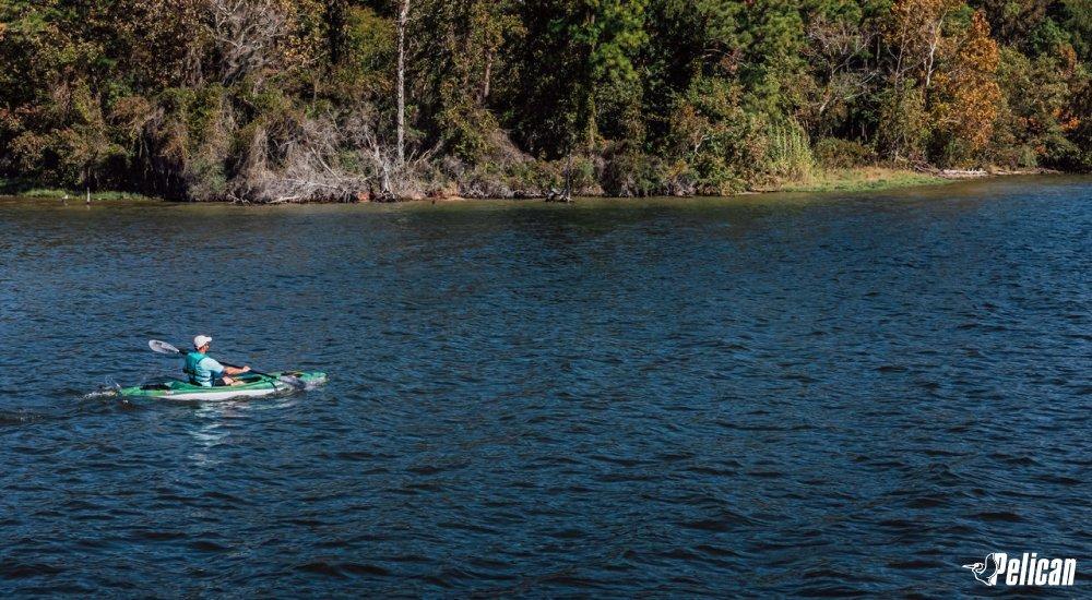 person kayaking on the water