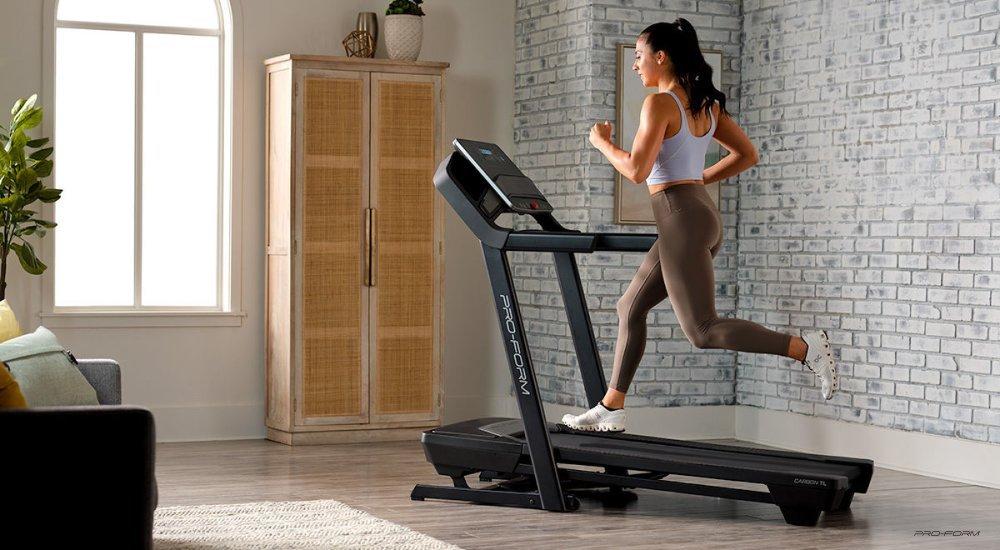 a woman running on her ProForm treadmill