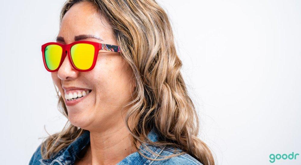 a lady smiling with her polarized lenses