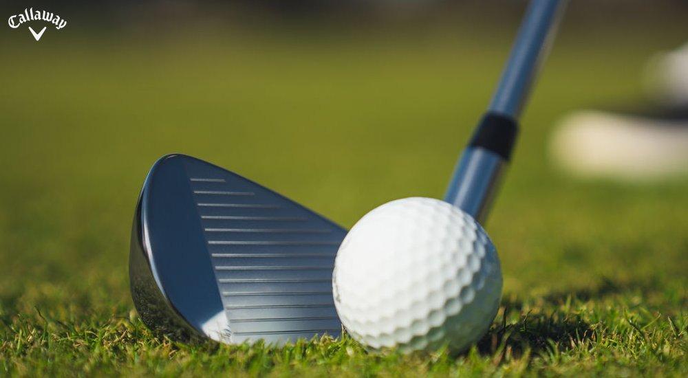 loft of a golf club about to tee off a golf ball