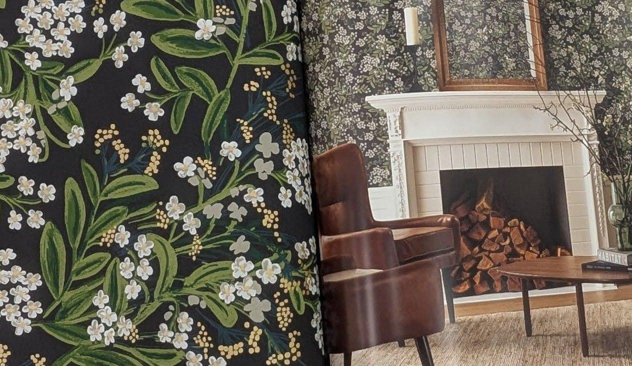 a fire place room with wallpaper