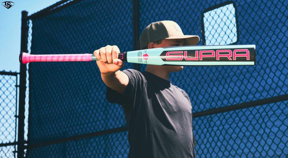 a player holding a usssa bat on the field