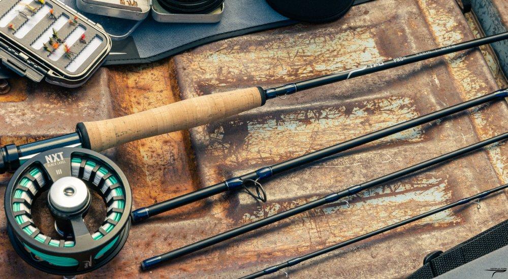 beginner fly fishing kit with rod, reel, flies, line, and net