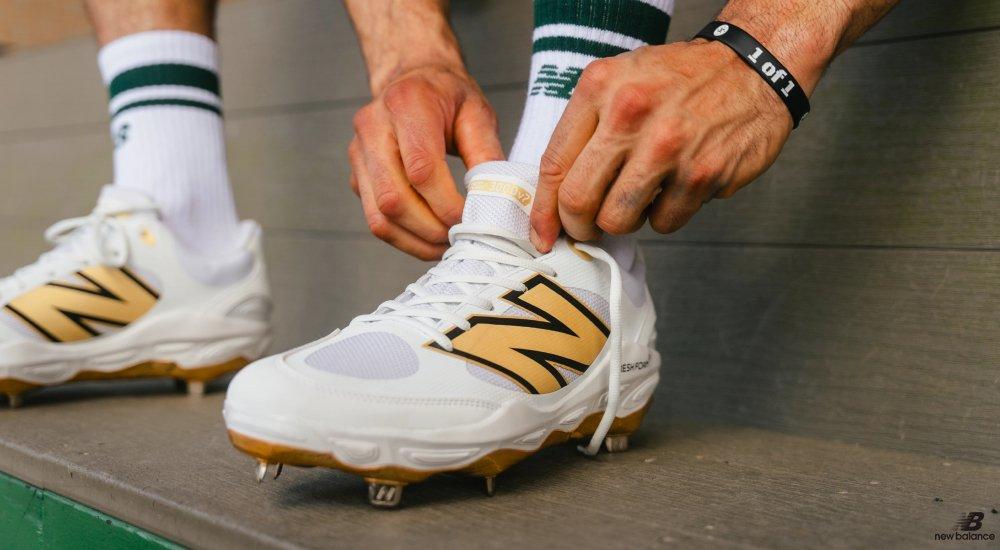 baseball player running through field