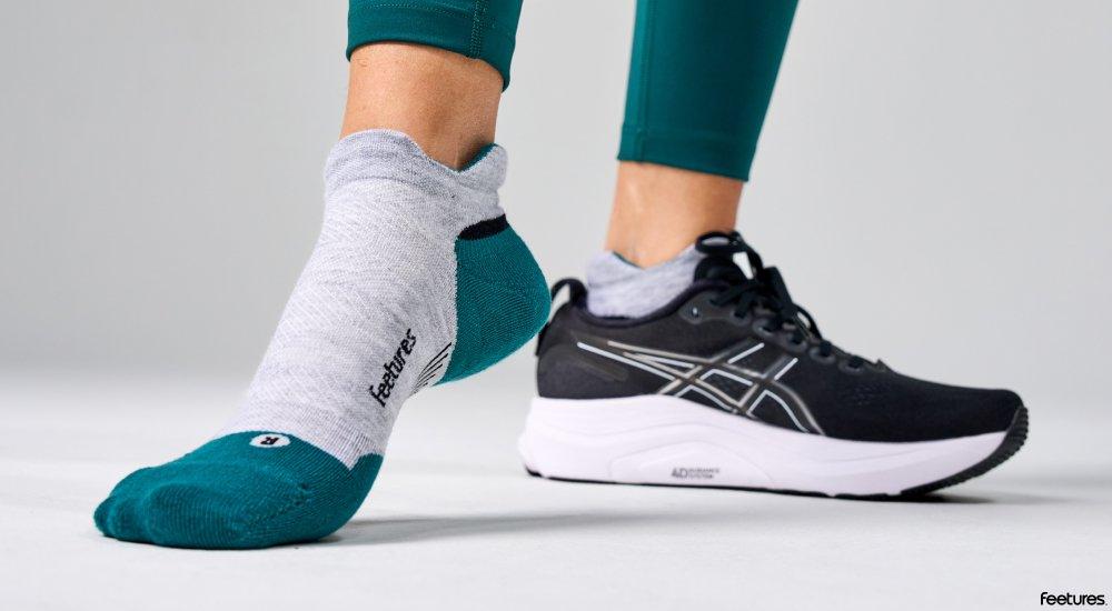a runner wearing a pair of feetures socks