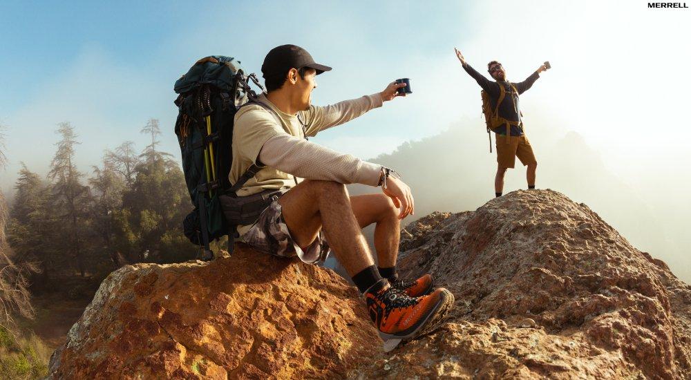 a group of people hiking in a mossy area