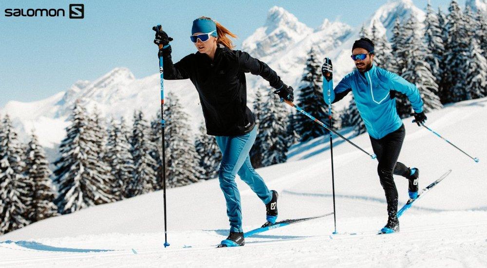two people cross country skiing