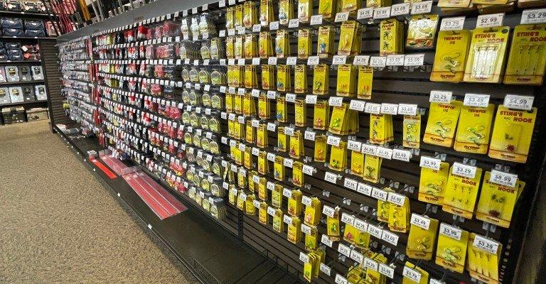 a variety of fishing lures on display at scheels
