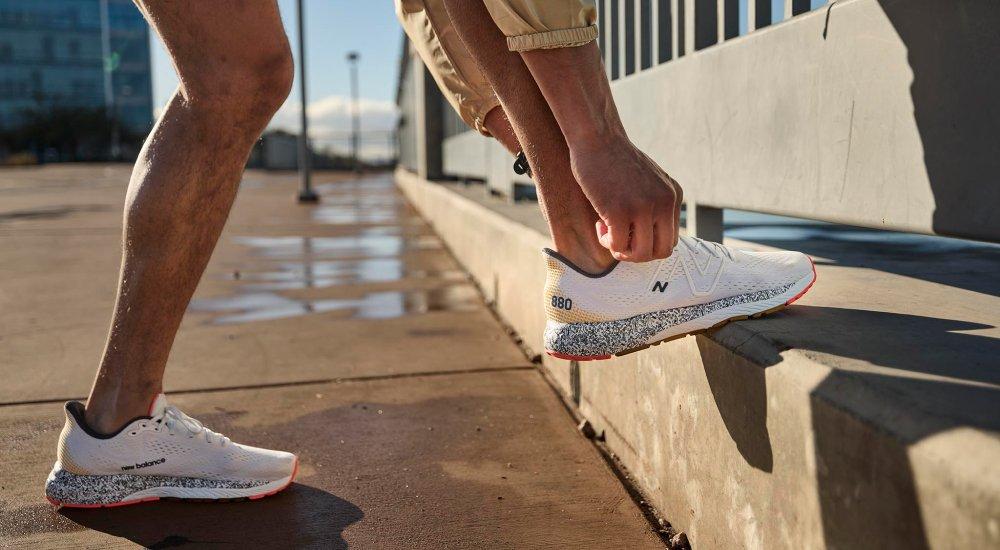 a group of 6 people running on the road in the mountains