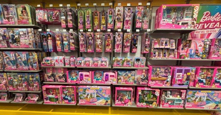 a selection of barbie dolls on display at SCHEELS
