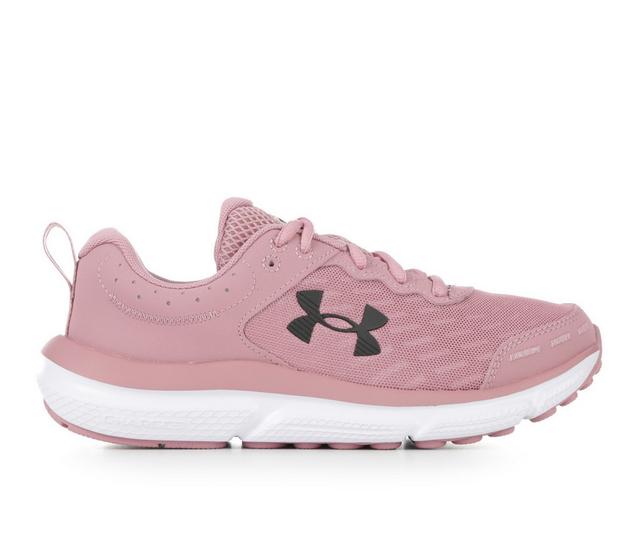 Women's Under Armour Charged Assert 10 Running Shoes in Pink color