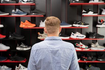 Man Shopping for Running shoes