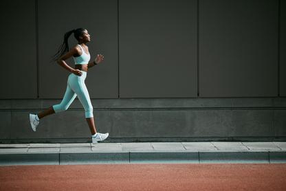 Woman running in a city setting