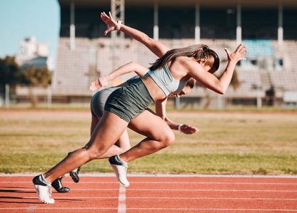 People sprinting on a track