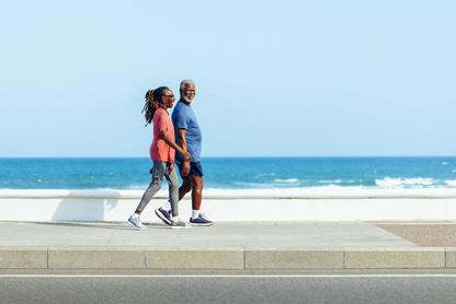 A couple walking by the seaside