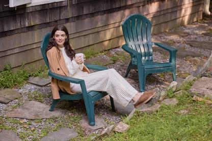 Woman sitting outside wearing White Mountain Blain clogs