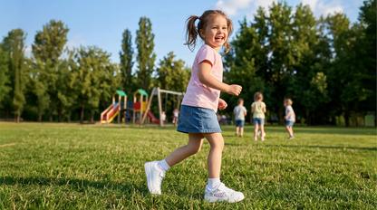 Girl running at the playground in Blu D'or Lyla shoes