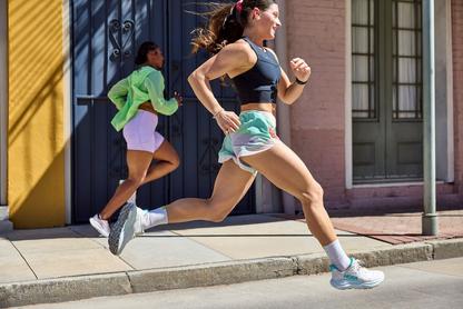 Woman running in Hoka Clifton 10 Shoes