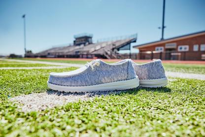 HEYDUDE Wally Grey Shoes on a Grass Football field