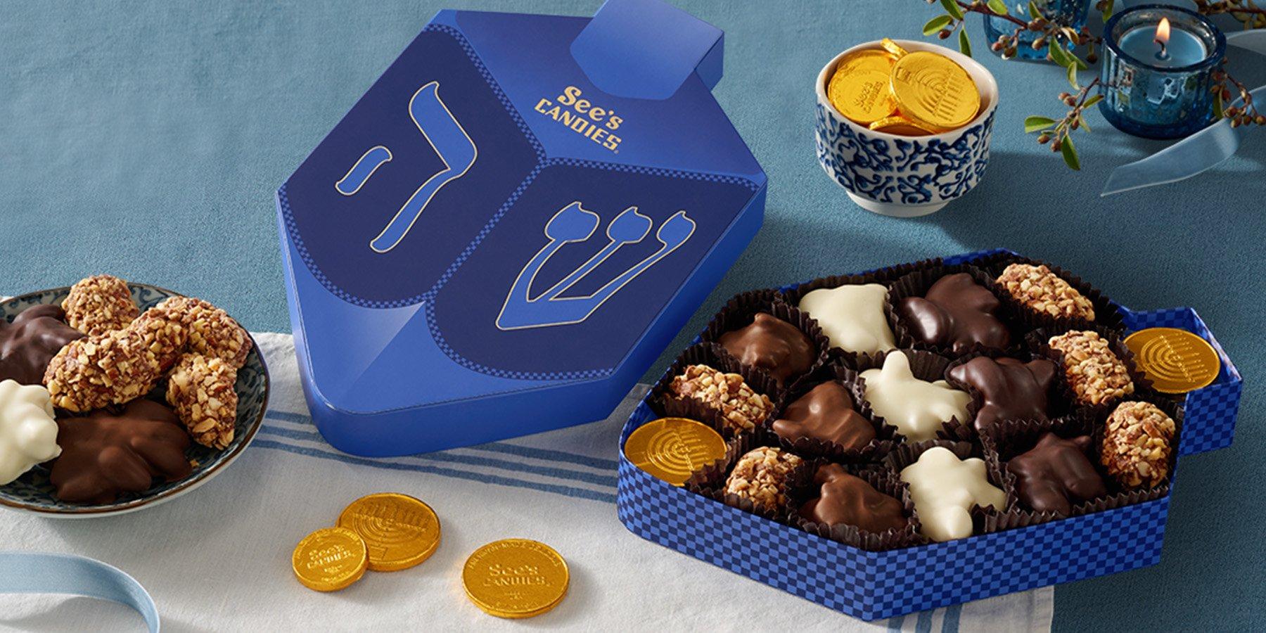 Close up look of an open box of See's Candies Dreidel Box 