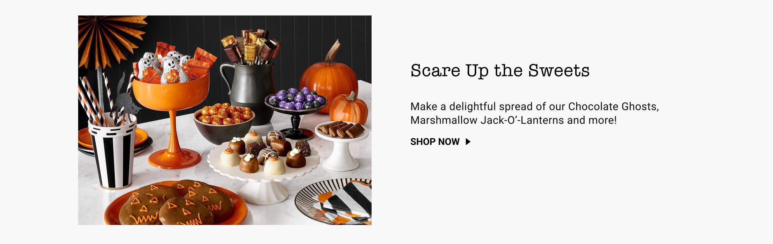 Scare Up the Sweets featuring a spread of Halloween treats