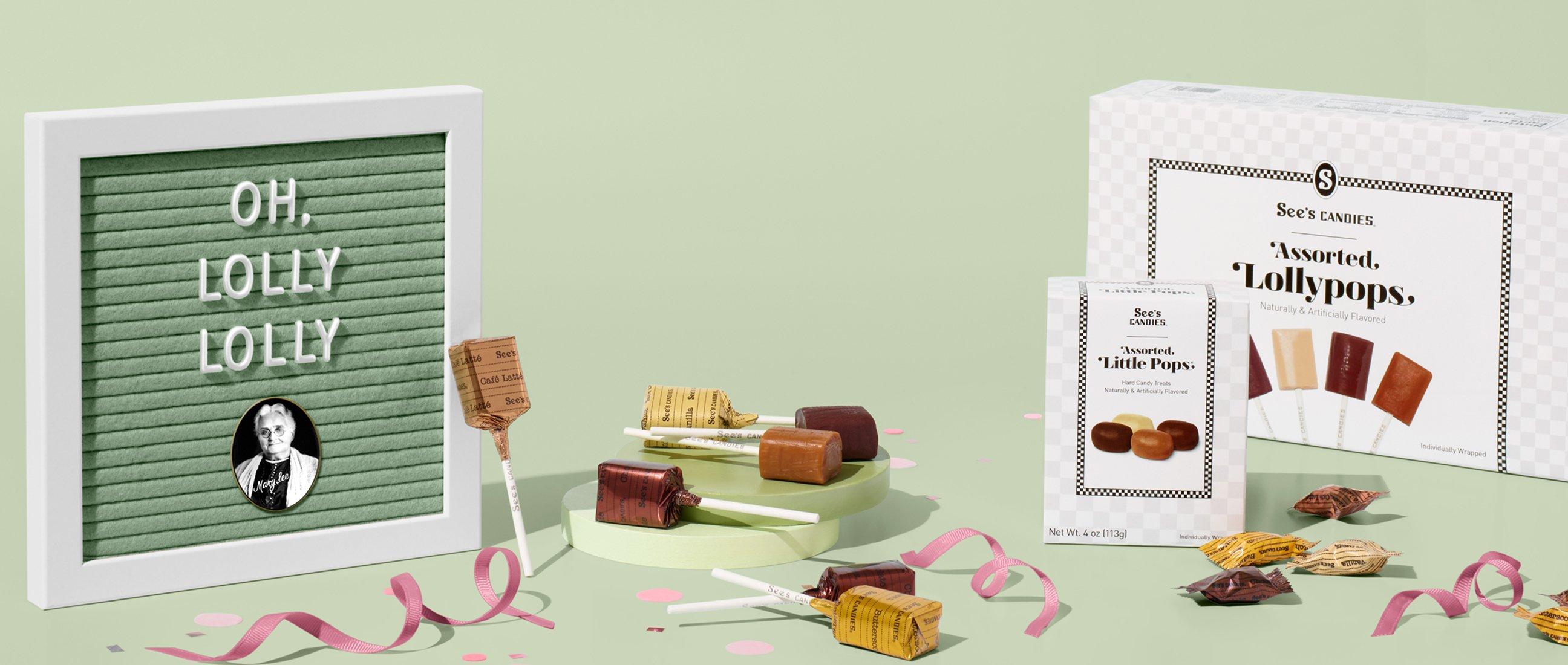 pastel green background with assorted lollypops