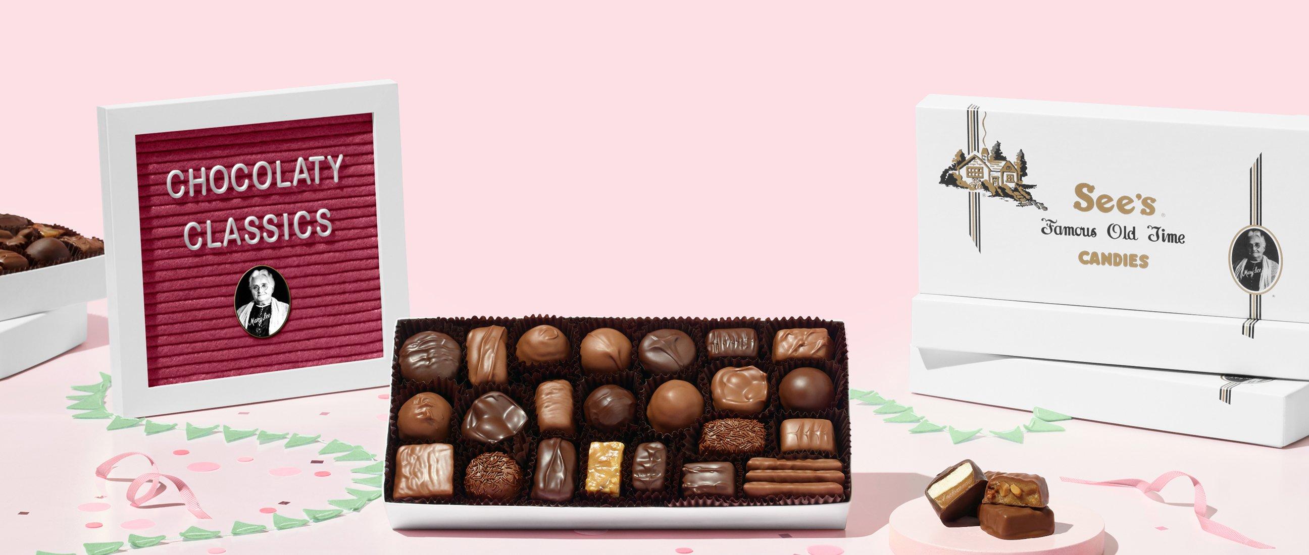 pastel pink background featuring deal for 1 and 2lb assorted chocolates