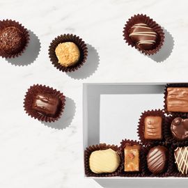 A box being filled with chocolates