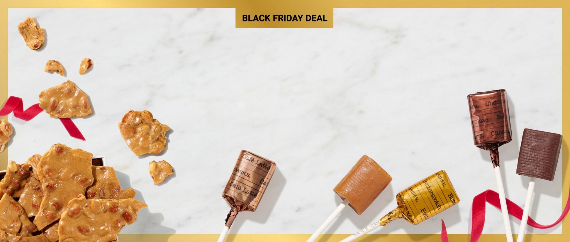 Gold border with See's Candies Peanut Brittle and Lollypops around