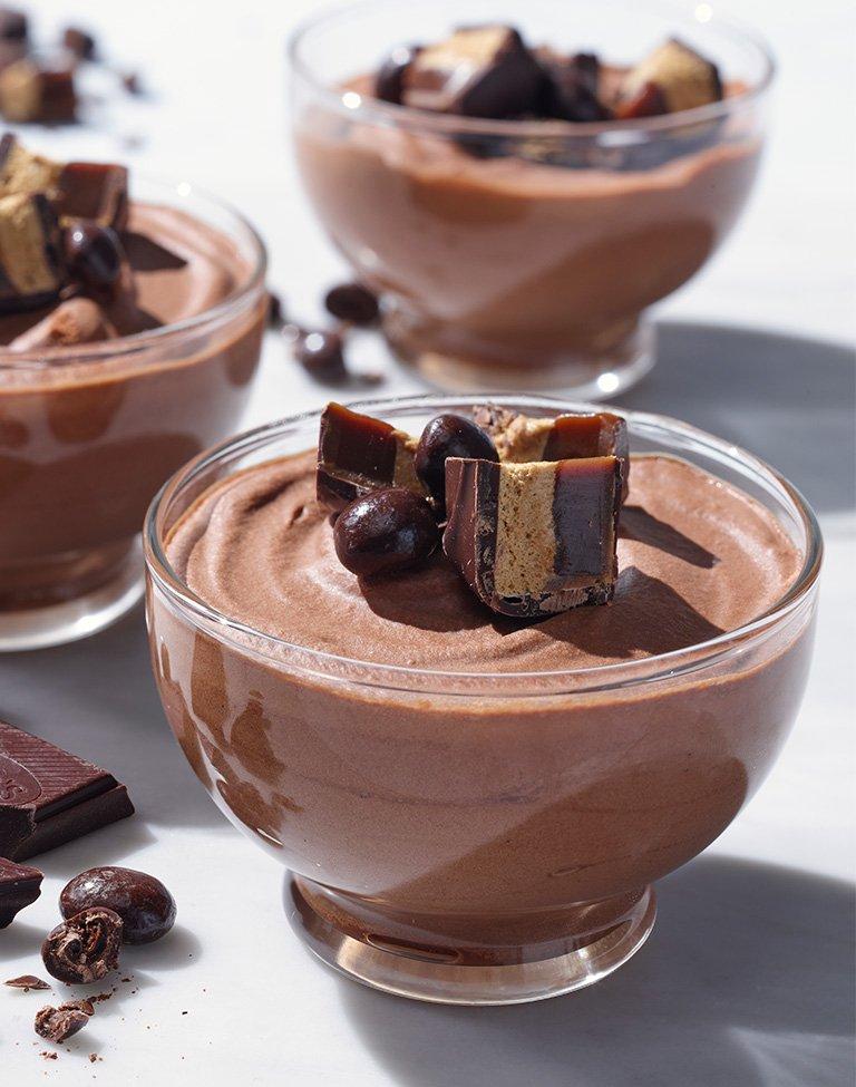 A glass bowl filled with chocolate mousse topped with topped with Dark Coffee Scotchmallows