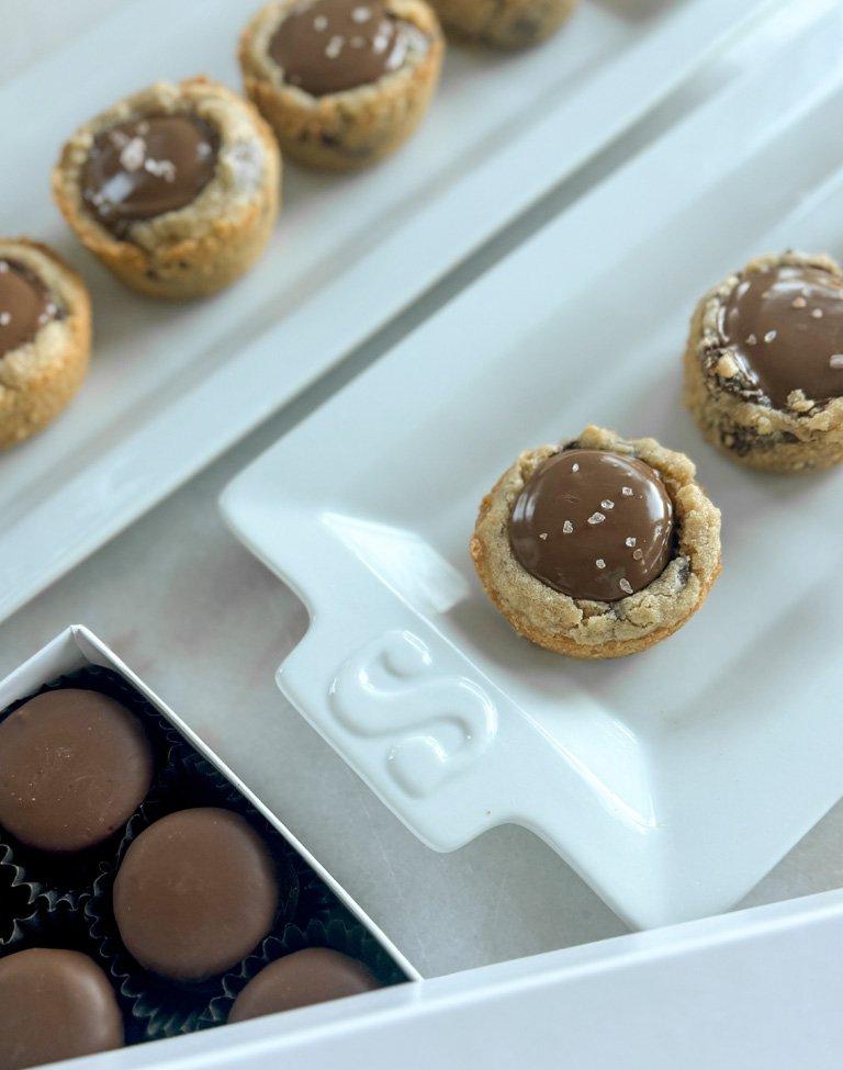 Peanut butter cookie cups on a white candy tray