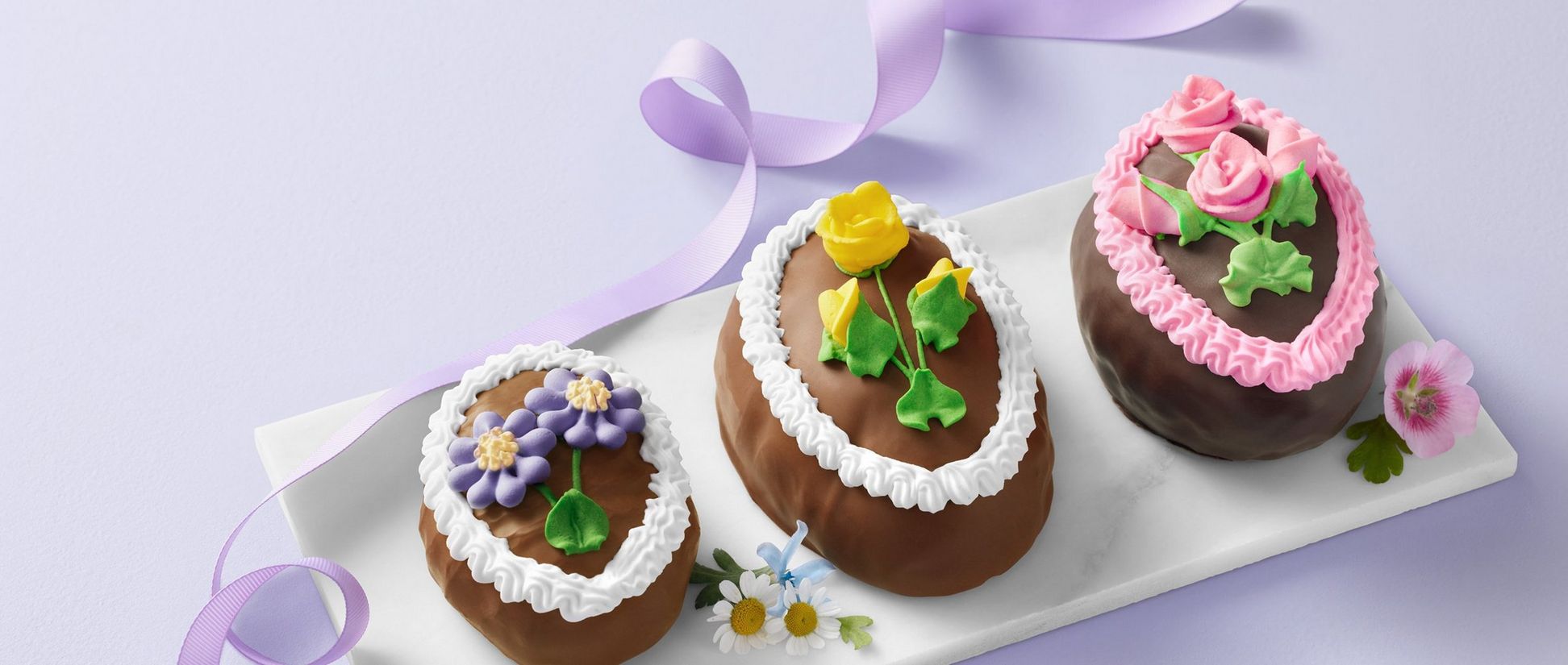 A row of decorated chocolate eggs