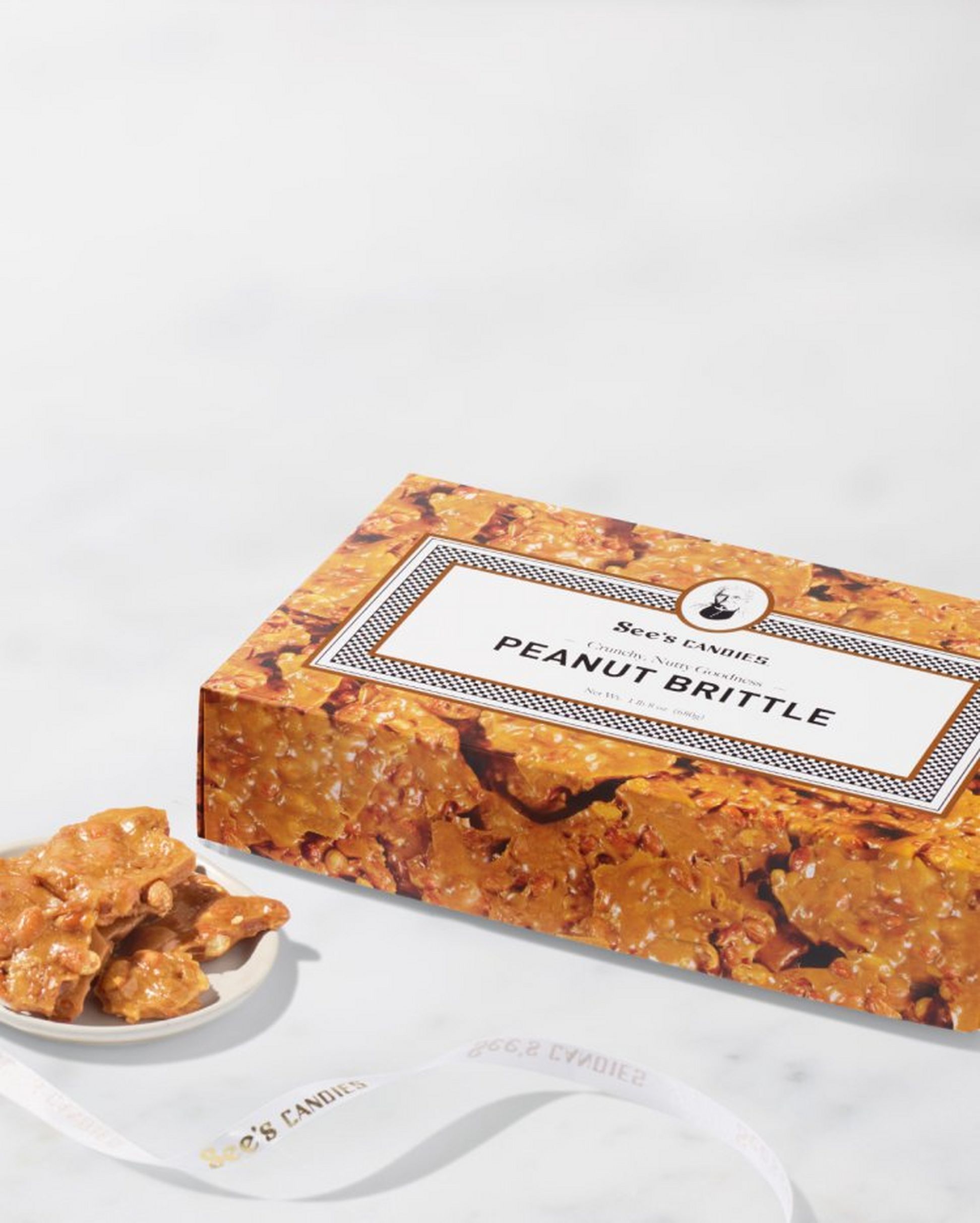 A box of 1 lb 8 oz Peanut Brittle