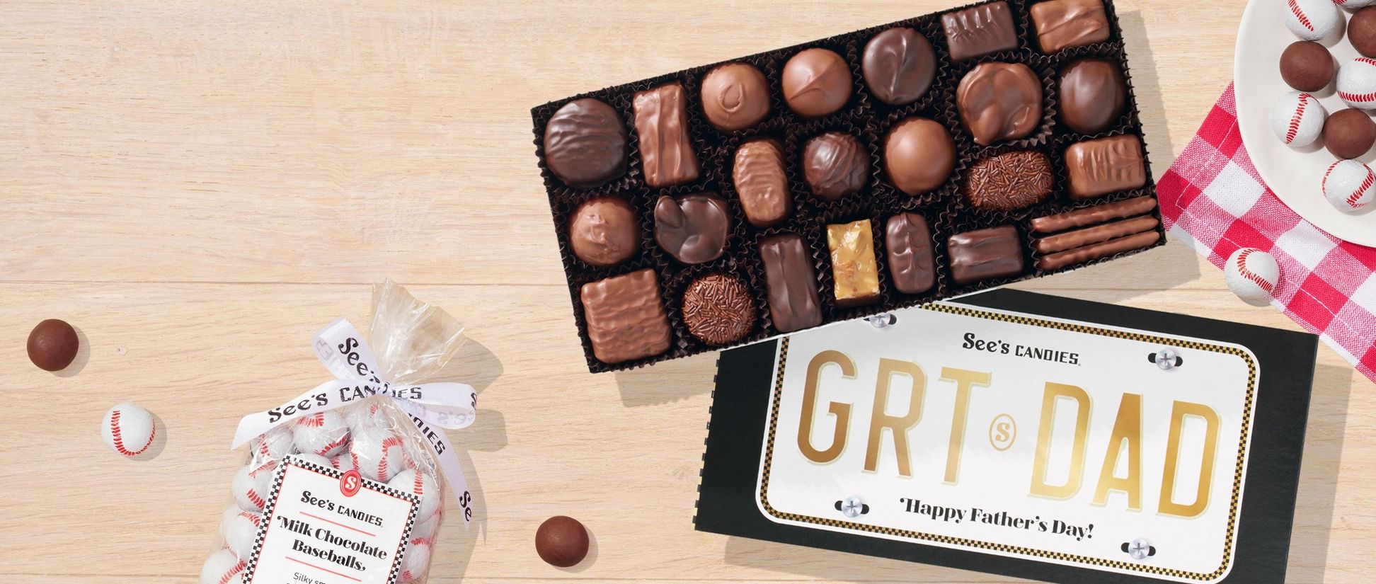 A box of chocolates designed like a license plate that says "GRT DAD"