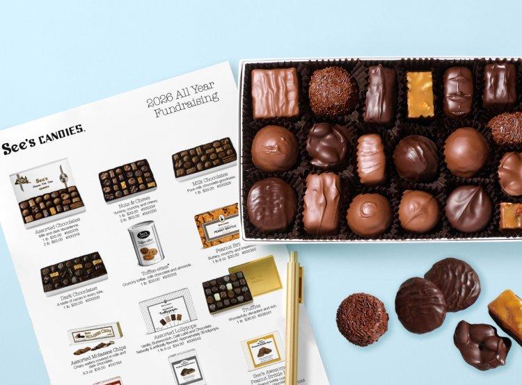 An All Year order form next to a box of chocolates