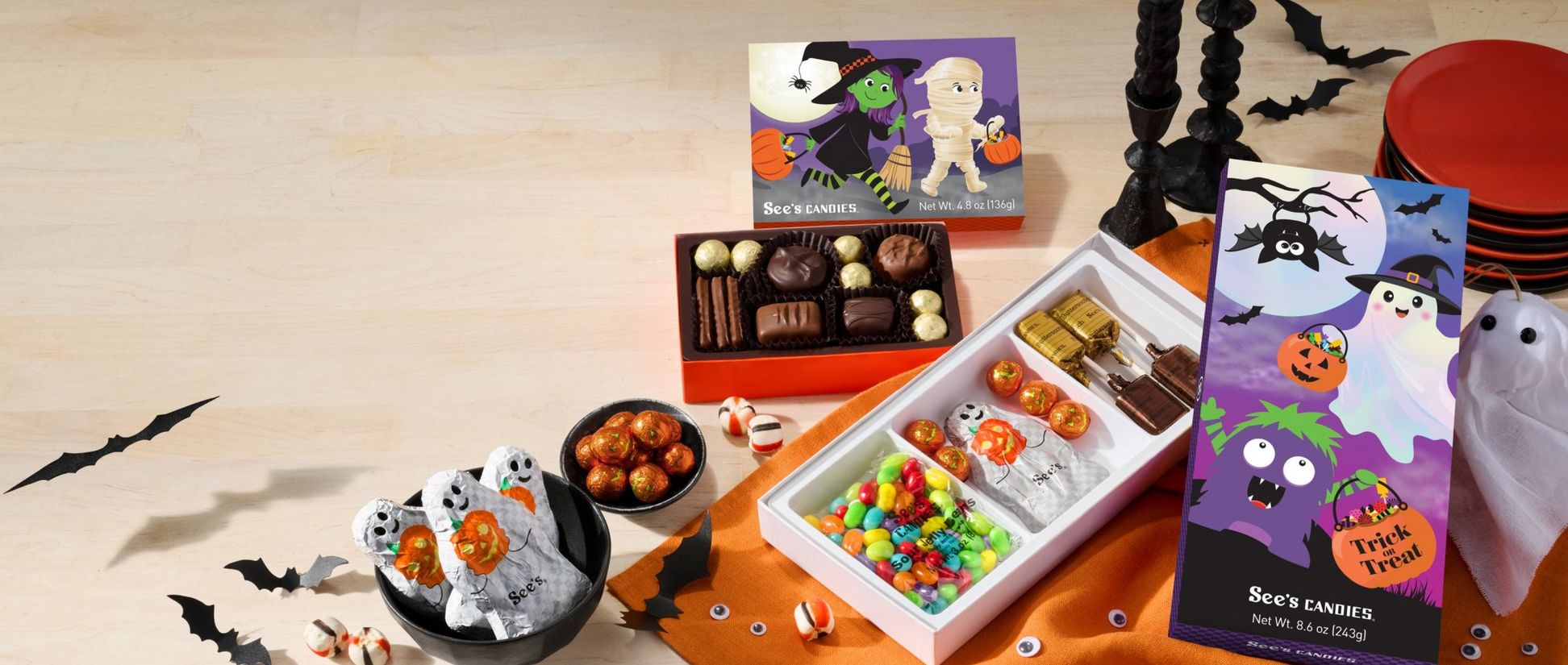 A halloween spread with kid-friendly candy and chocolate