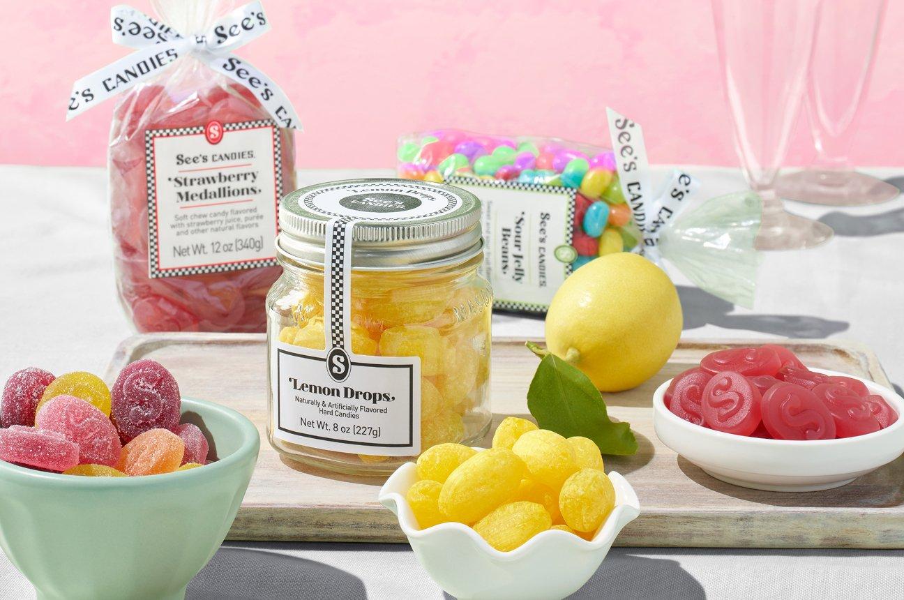 various melt-free treats featuring lemon drops, strawberry medallions, and jelly beans