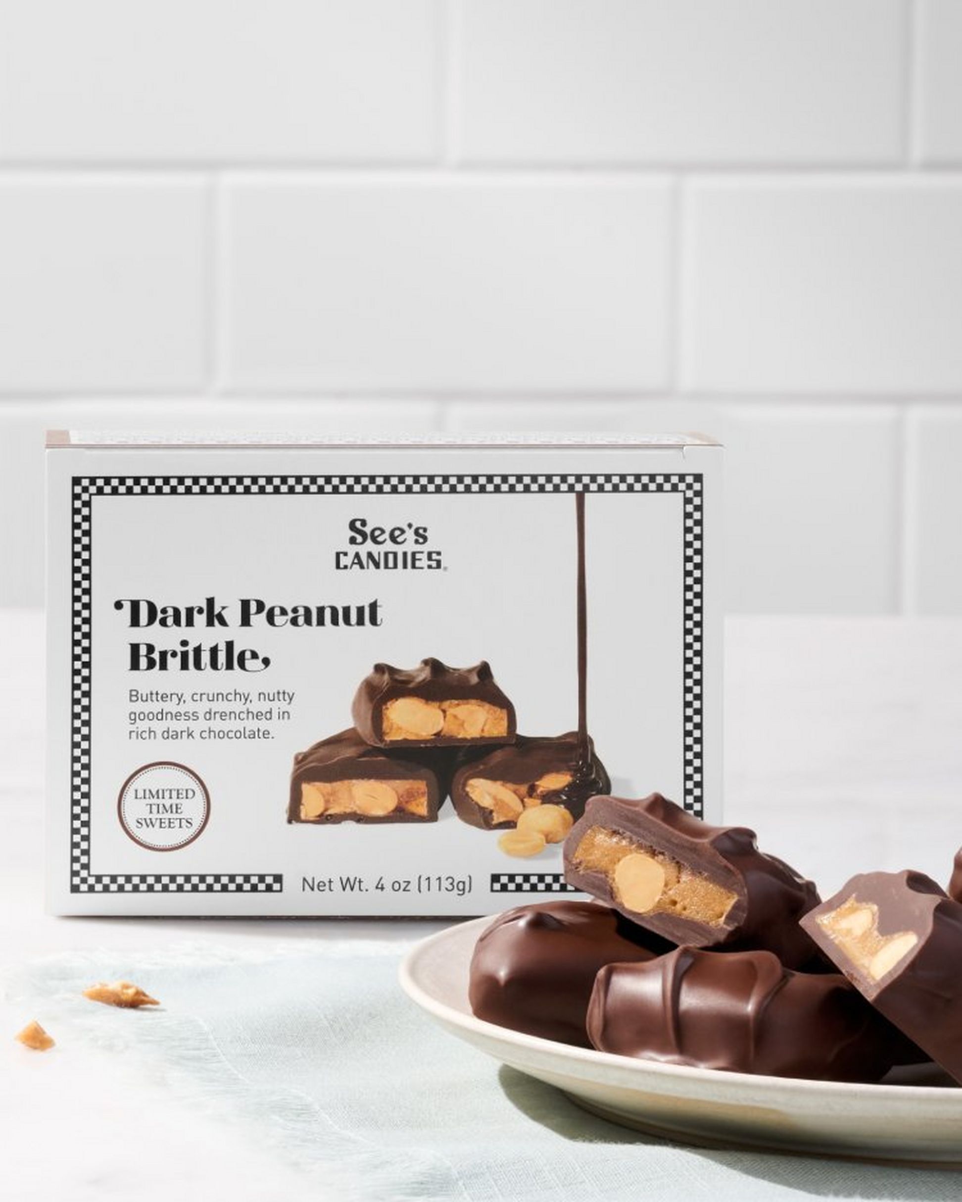 A box of See's Candies Dark Peanut Brittle