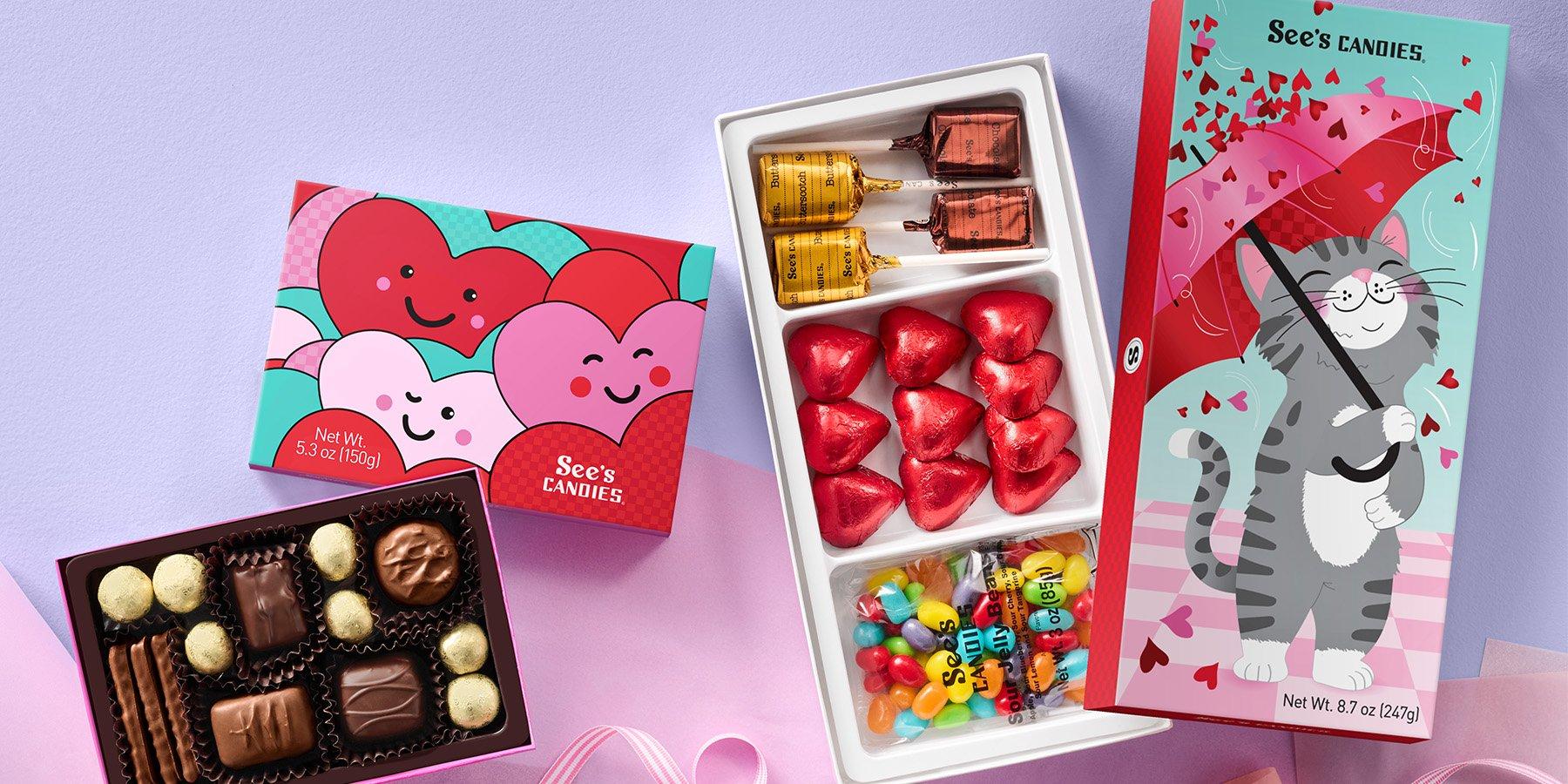 Array of different Valentine's Day boxes featuring See's Kitty Crush Box and I Heart You Box