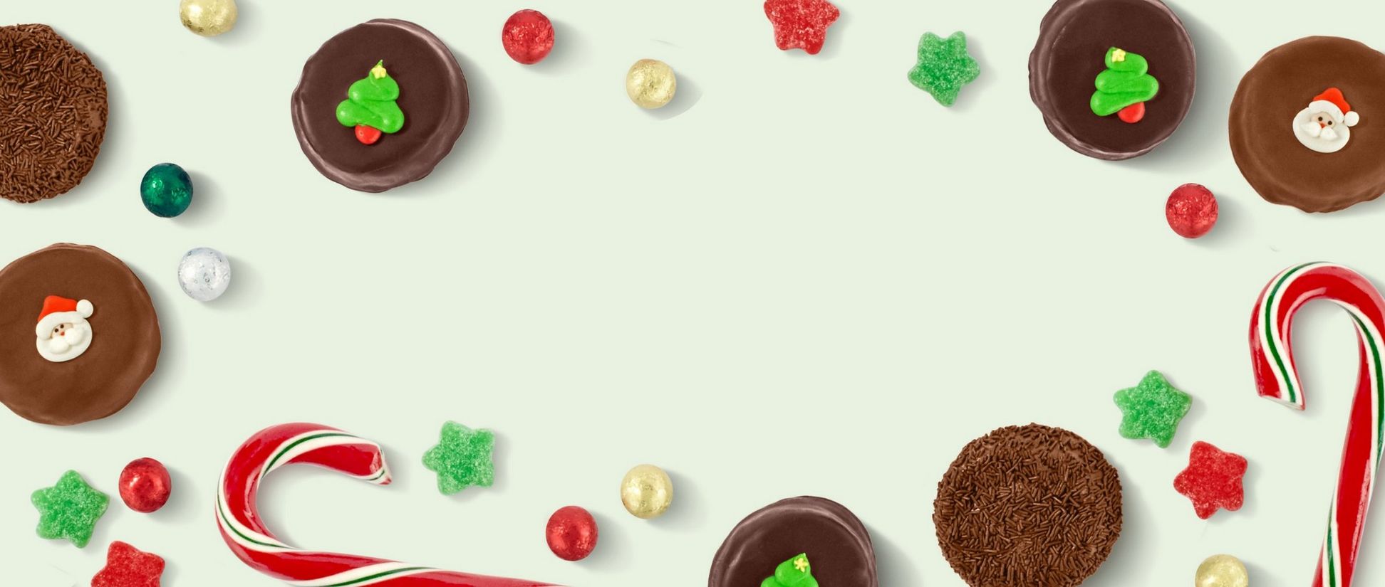 Christmas Candy border with See's Candies on a light green background