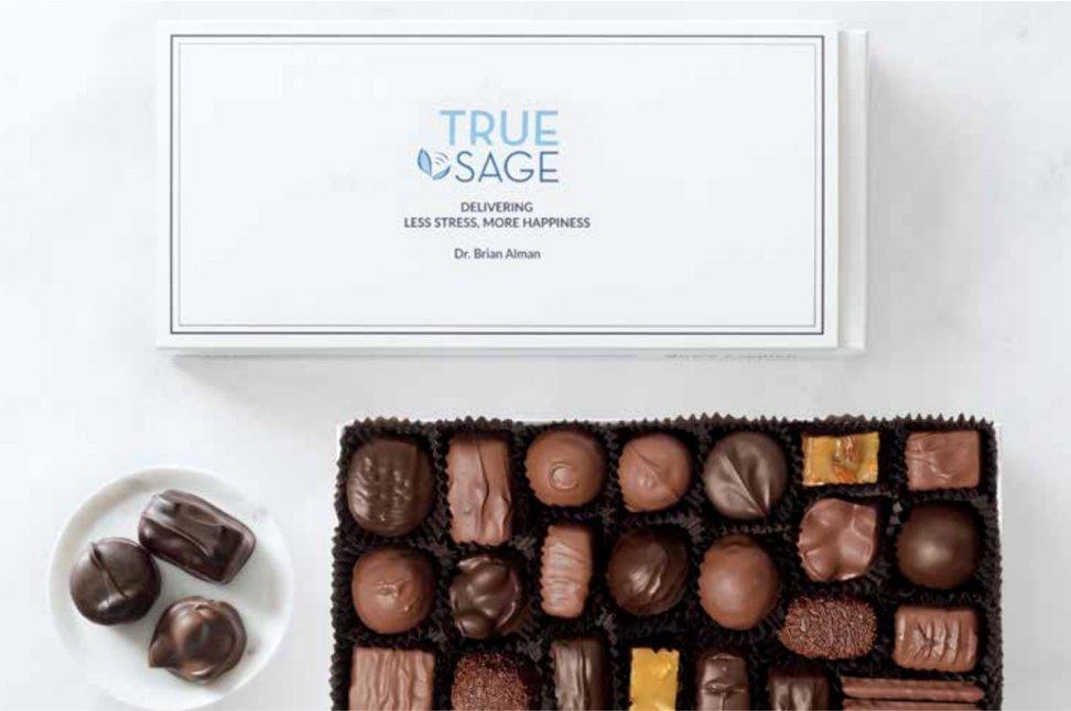 A box of assorted chocolates with a custom logo