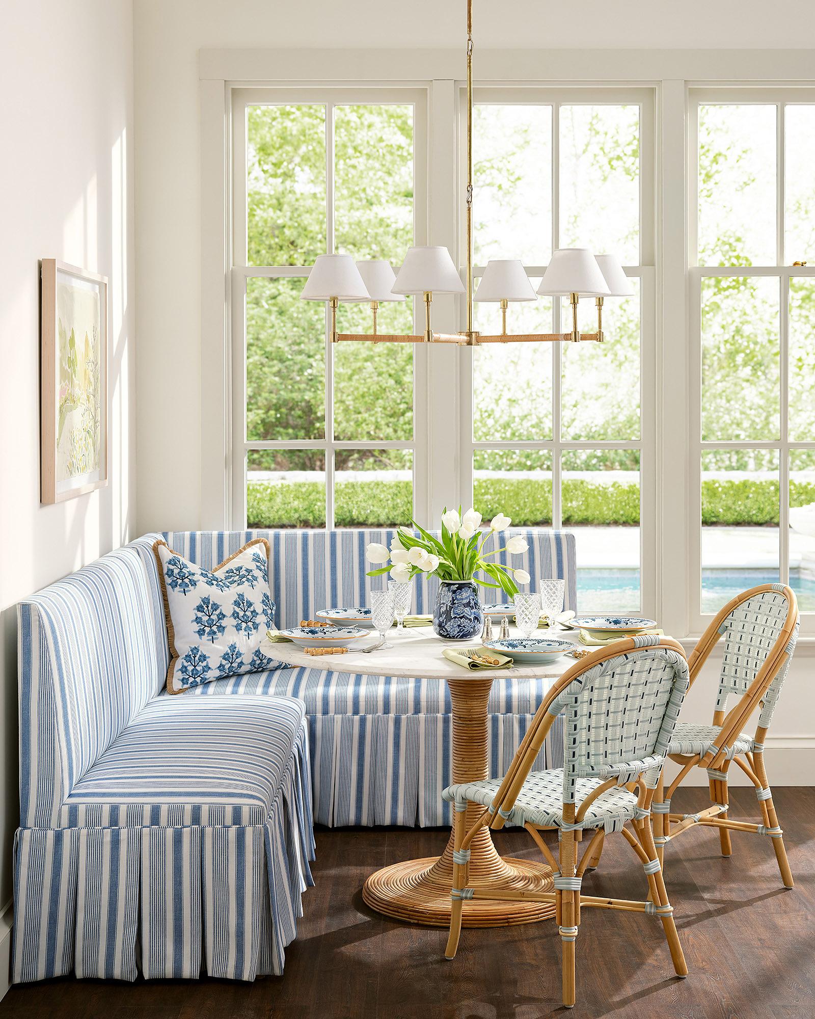 Dining-Room-French-Blue-Stripe-Banquette-Ross-Rattan-Marble-Pedestal ...