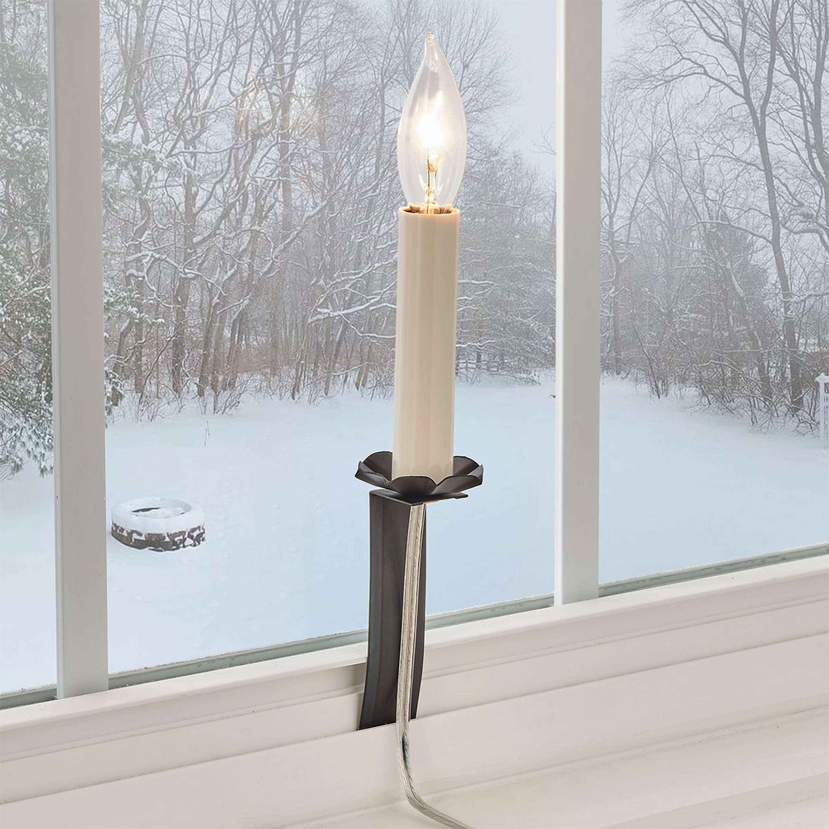 A Colonial Metalcrafts Window Candle with Darkened Copper color
