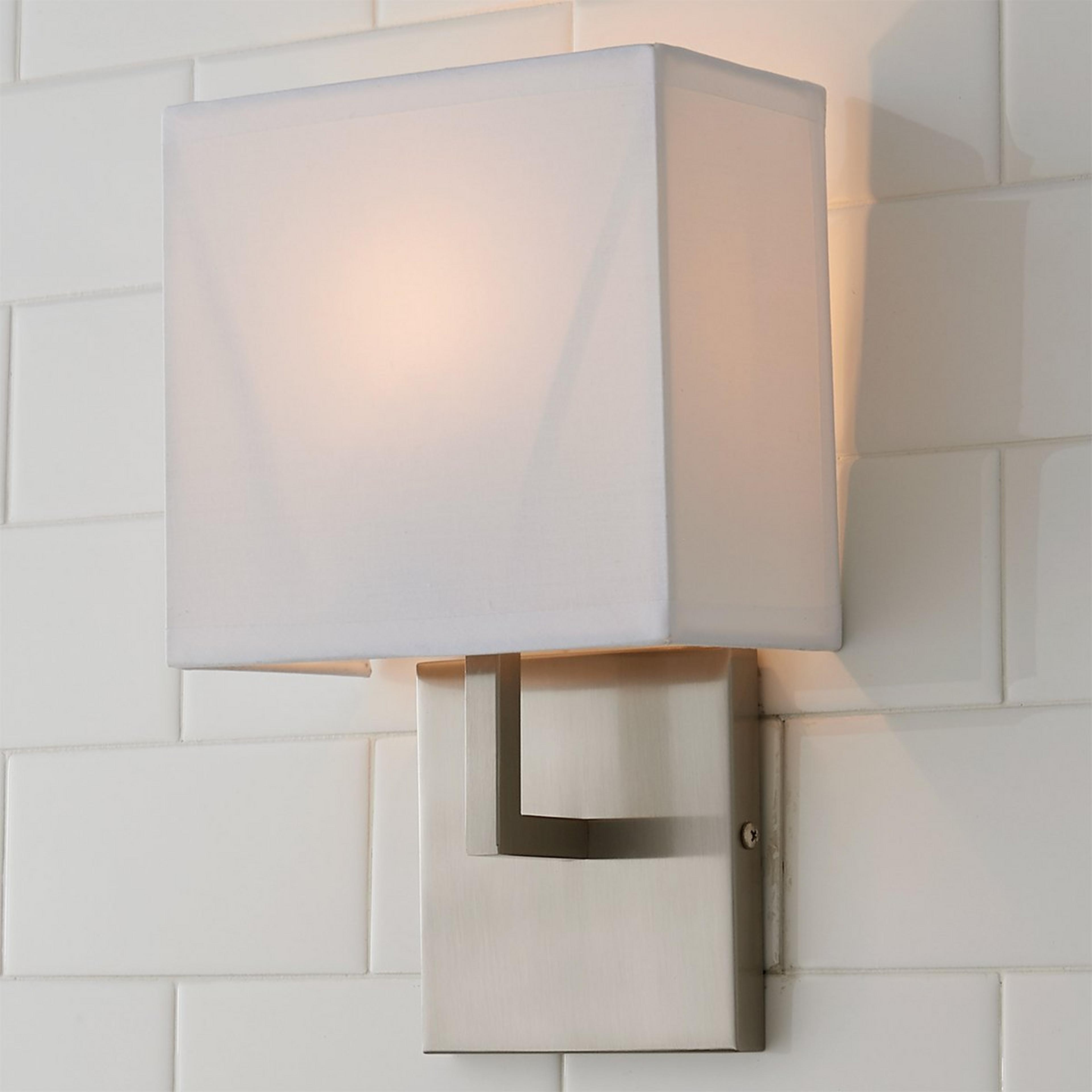 A Uptown Bath Sconce with Brushed Nickel color