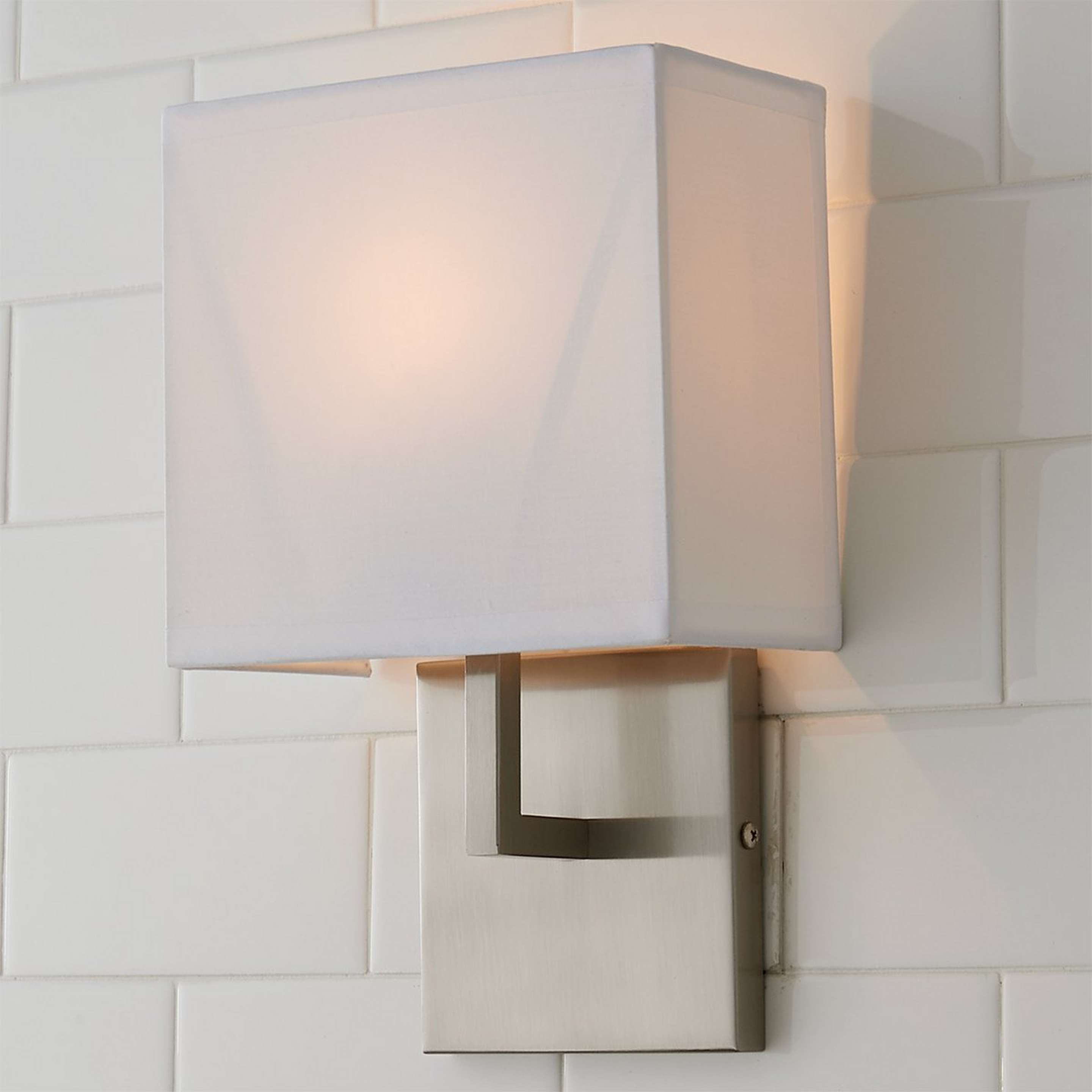 A Uptown Bath Sconce with Brushed Nickel color