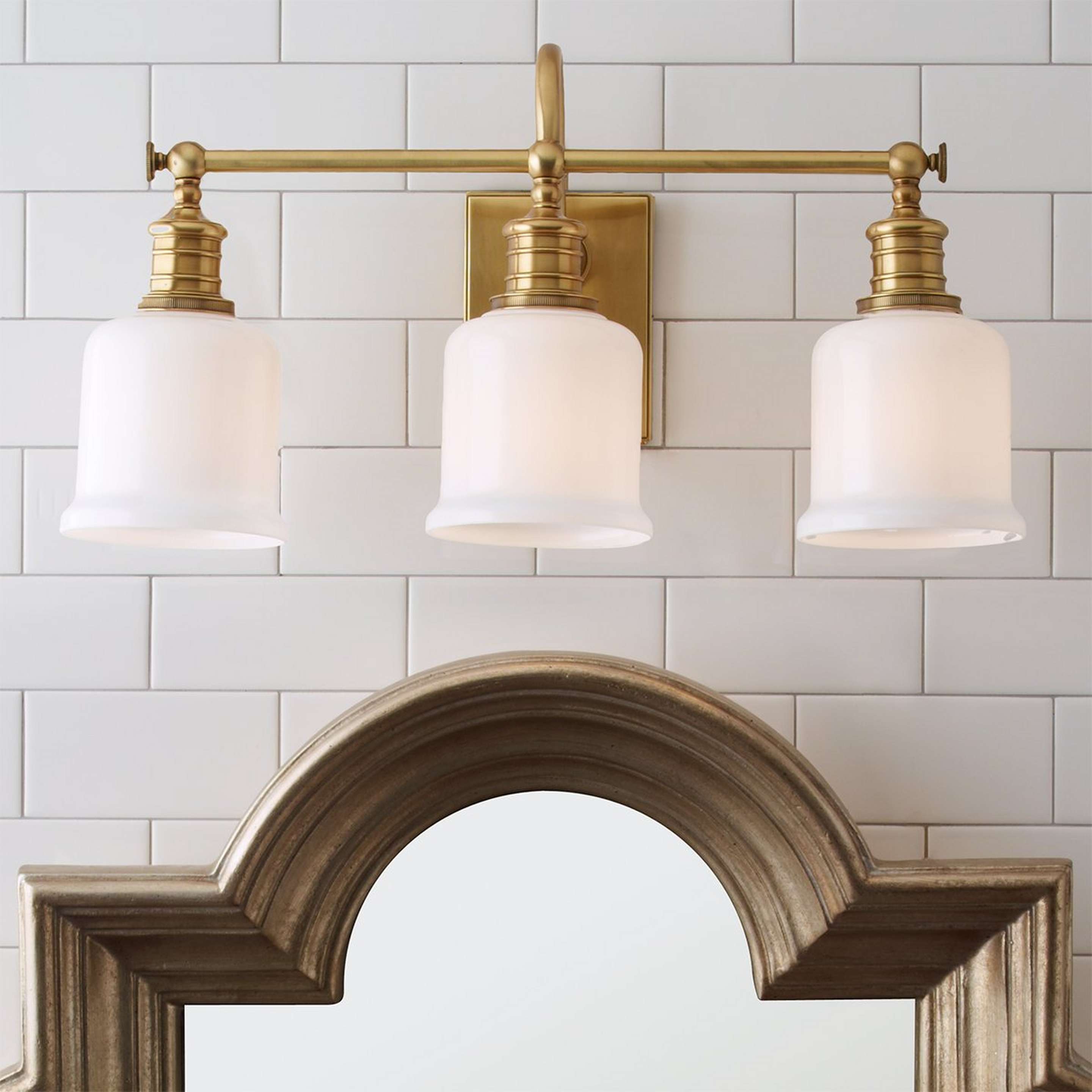 A Well Appointed Vanity Light - 3 Light with Antique Brass / Opal Glass color