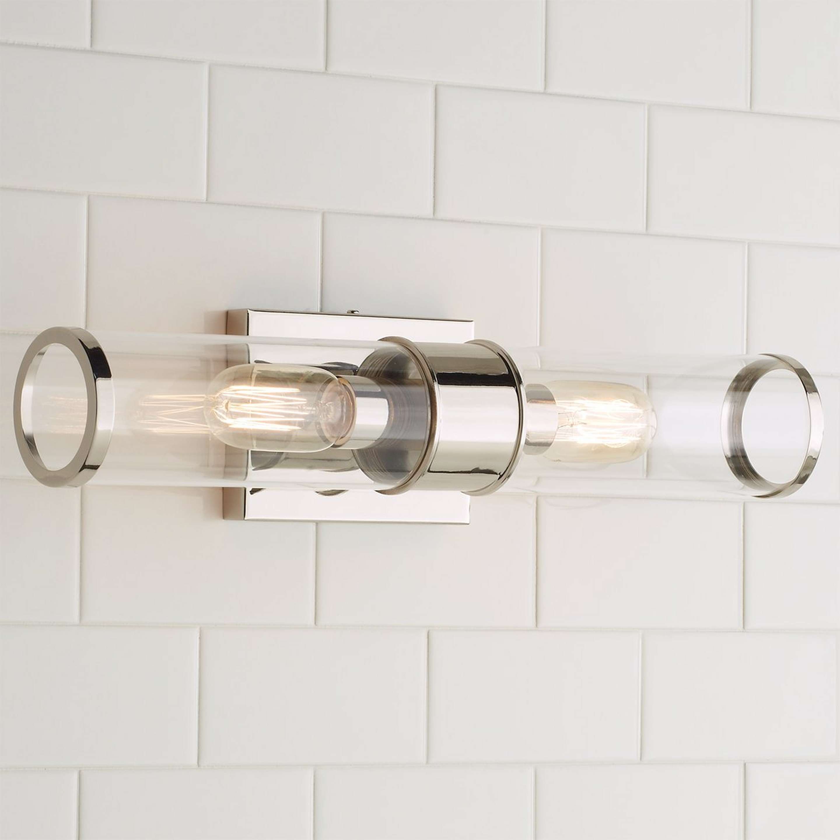 A Simple Glass Cylinder Sconce - 2 Light with Polished Nickel / Clear Glass color