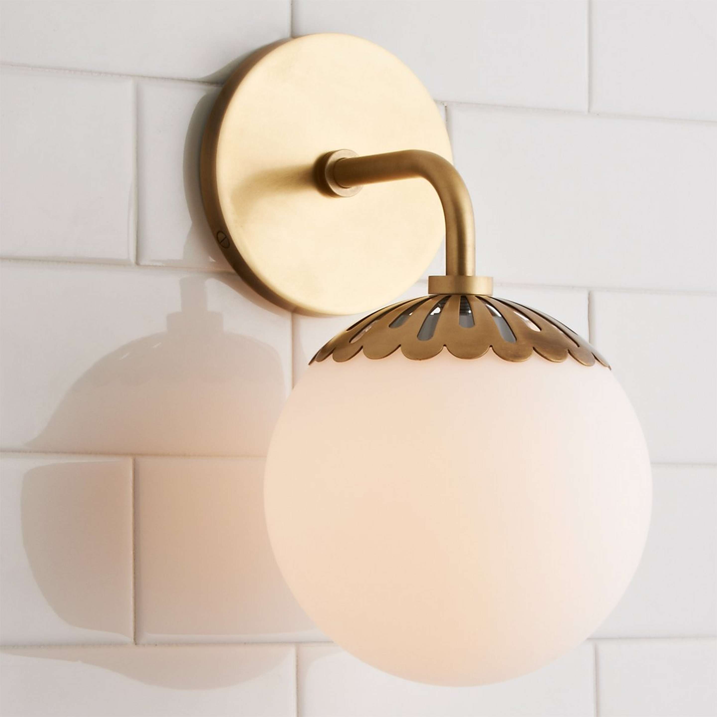 A Dewdrop Globe Sconce with Satin Brass color
