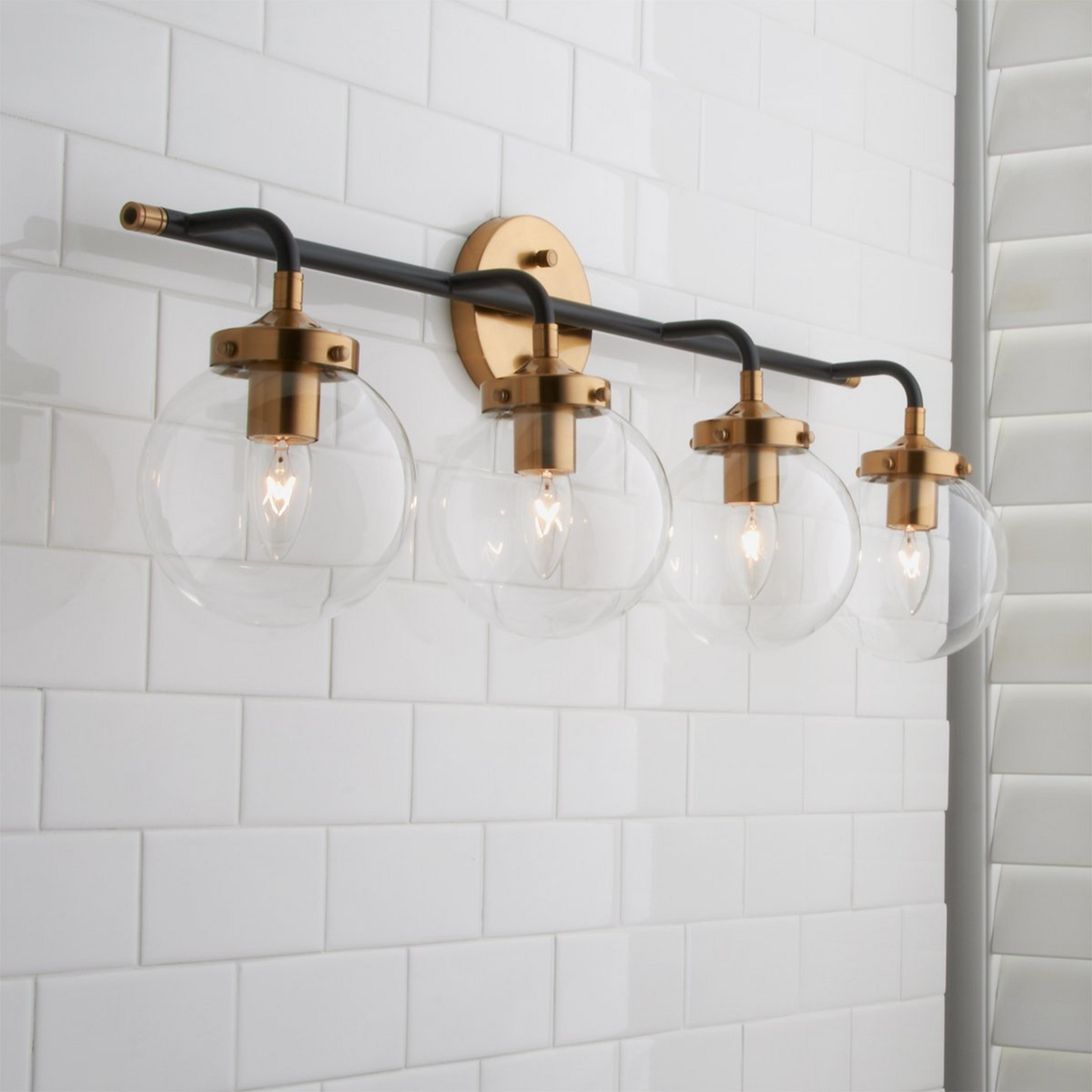 A Mixed Metal Globe Vanity Light - 4 light with undefined color