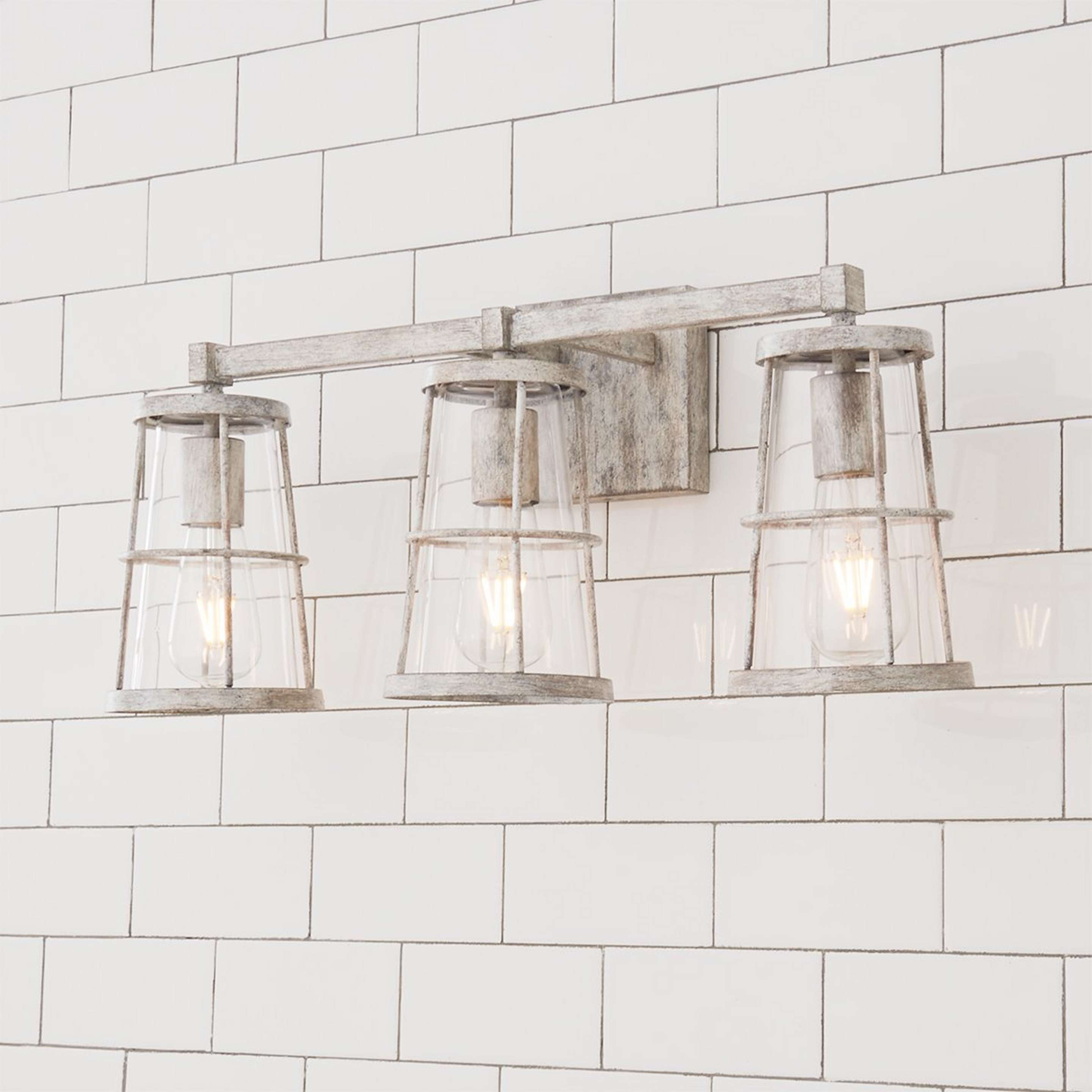 A Coastal Cottage Vanity Light - 3 Light with Distressed Cream color
